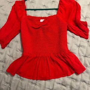 Red blouse from pink lily
